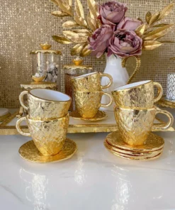 Inspire Me! Home Decor Gold Textured Metal Tea Cup And Saucer With White Interior