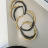 Inspire Me! Home Decor Gold And Black Loop Wall Decor